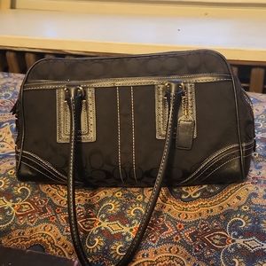 Black and gold Coach purse